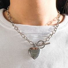 "[Size] 15 inches 16.5\"------> model is wearing this size. 18\" 19.5\" -Model's neck is 12.5 inches and wearing 16.5 inches necklace.  [Content] -Material: 100% Surgical Steel -Toggle size: 14mm (outer) -Heart locket Size: 19 x 22mm **Hypoallergenic and Non-Tarnish **Please watch the video for checking details.  **Measurements are an approximation. Size, shape and color can vary slightly from above dimensions." Love Locket, Necklace Girlfriend, Side Items, Necklace Photo, Heart Locket Necklace, Small Bracelets, Toggle Necklace, Photo Locket, Lovely Necklace