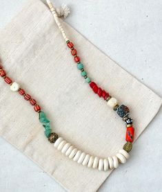 This Handmade Ethnic Necklace is a very unique beaded jewelry, which is going to be yours if you are here.  Its ethnicity and elegance comes from the traditional tribal ethnic design and boho minimalist string structure. It is designed and produced by local shaman artisans. Shamanism is known as a nature worship belief. Shamans bound their soul with nature. Our necklace is designed and is became alive with this bound. If you would like a distinctive, unique, ethnic and dainty necklace, Zoho Acce Luxury Traditional Handwoven Jewelry, Cheap Traditional Handwoven Jewelry, Cheap Bohemian Jewelry For Puja, Tibetan Necklace Bohemian, Cheap Handwoven Festival Jewelry, Tibetan Jewelry Boho, Nature Worship, Unique Beaded Jewelry, Tibetan Jewelry