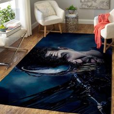 a living room area rug with a woman's face on it