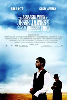 a movie poster with two men standing next to each other in front of a cloudy sky