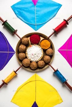 an overhead view of some colorful kites on the ground - stock photo - images