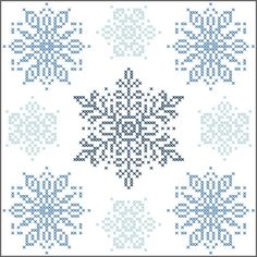 a cross stitch snowflake pattern in blue and white, on a white background