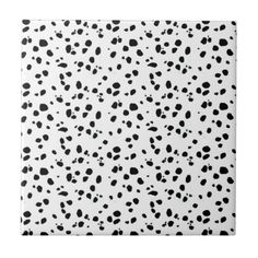 black and white spotted animal print tile