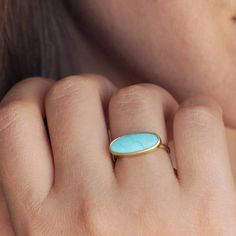 14k Solid Yellow Gold Large Oval Arizona Turquoise Statement Ring / Minimalist Solid Gold Jewelry Engagement Gift Ring for Groom-Wife ★ Description ★  * Gemstone : Arizona Turquoise * Turquoise Size : 5x16 mm approx   * Large Oval Turquoise  * 14K Solid White Gold, ( Available in 14K & 18K Yellow, Rose, and White Gold ) * Option available in 18K Gold  * Ready to Ship in 1-2 Weeks ≫ FAQ below for more detail. ✦ Sizing We can adjust most items to fit your sizing preferences. Most items can be made to any size and length. Please leave a note at checkout or contact us via Etsy conversation. Even after purchasing the item, you can still ask us to adjust the size or length. We will try our best to fix it if it is possible. ★ Rings also available in other gemstone for enquire please contact with Turquoise Statement Ring, Arizona Turquoise, Ring Minimalist, Solid Gold Jewelry, Gift Ring, Yellow Rose, Engagement Gifts, Solid Yellow, Statement Ring