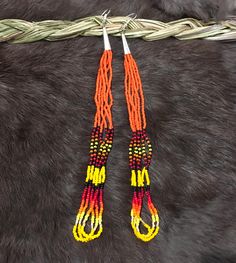 Authentic Beautiful Native American Indian Jewelry Navajo Hand Beaded Long Dangle Earrings. Great for a gift❤️ Handcrafted by Navajo Artist R. Sellers These beautiful earrings are 8" in length and 1" in width. Southwestern Orange Jewelry With Colorful Beads, Southwestern Style Orange Jewelry With Colorful Beads, Southwestern Style Handwoven Dangle Jewelry, Southwestern Style Beaded Earrings For Festival, Adjustable Southwestern Beaded Earrings, Adjustable Hand-strung Southwestern Beaded Earrings, Southwestern Multicolor Beaded Earrings, Indian Jewelry Earrings, American Indian Jewelry