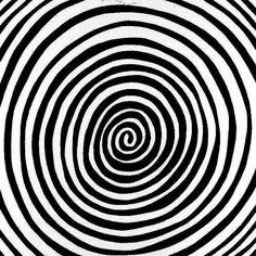 an abstract black and white pattern with spirals in the center, as if it were optical art