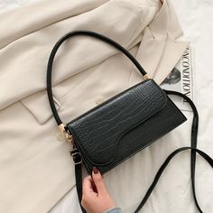 Brand Name: SWDFShape: FLAPHandbags Type: Shoulder BagsTypes of bags: Shoulder Crossbody BagsOrigin: CN(Origin)Main Material: PUClosure Type: zipperHardness: SOFTExterior: NONEStyle: FashionModel Number: lmz0707Lining Material: PolyesterOccasion: VersatileGender: WOMENPattern Type: GeometricNumber of Handles/Straps: SingleInterior: Cell Phone PocketDecoration: BowItem Type: HandbagsWomen handbags Gender: Women/Girl/Lady/Female/FemininasStyle: Japan and South KoreaShape: Shell ShapeHandbags Type: Baguette Bags, Alligator Pattern, Backpack Clothes, Designer Shoulder Bag, Brand Handbags, Popular Handbags, Handbags Designer, Elegant Bags, Designer Shoulder Bags