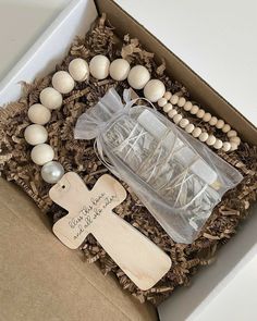 a box filled with wooden beads and other items