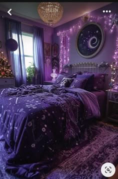 a bedroom decorated in purple with lights and decorations