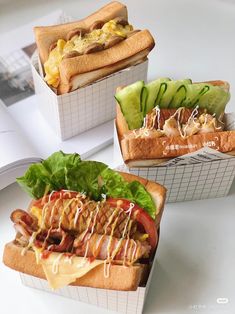 three sandwiches with different toppings on them