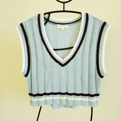 Super Cute Sweater Vest. Great Over A T-Shirt, Button Down, Or Turtleneck! Feels Almost Silky. 100% Acrylic. About 18 1/2" From Armpit To Armpit. About 17" From Shoulder To Front Hem Bottom. Preppy V-neck Tops For Spring, Preppy Blue V-neck Top, Blue V-neck Preppy Tops, Cute Sweater Vest, Crop Sweater Vest, Cute Sweater, Crop Sweater, Cute Sweaters, Shirt Button