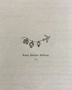 an old book with the words rest, restart, refocus written on it