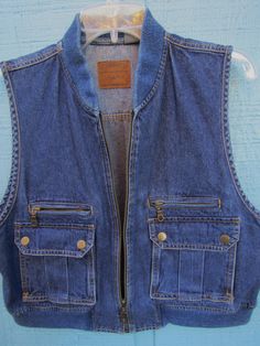 "Liz Claiborne sports a label called Liz Wear. Authentic tradition which was established in 1976. Made in Indonesia of 100% Cotton fiber. Machine Washable, and tumble dry low. A super cool vintage denim vest with a slight fisherman style vibe going on. Here you have a very nice vintage denim vest. Very cool styling with huge pockets that snap shut up front on either side of the zipper also have a separate entry outside for your hands to stay warm and comfortable. Also just above these useful poc Safari Barbie, Surface Pattern Design Inspiration, Vintage Denim Vest, Military Vest, Fisherman Style, Pattern Design Inspiration, Waist Coat, Jean Vintage, Upcycle Jeans