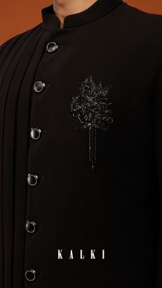 Black embroidered indo-western sherwani set.
The outfit is fabricated in imported suiting fabric.
It comes in a high-low panel cut with a mandarin collar neckline along with sequins, and cutdana embroidery. Cutdana Embroidery, Haldi Outfits, Black Suit Wedding, Indian Designer Suits, Suiting Fabric, Indo Western, The Outfit, Sherwani, Black Suits