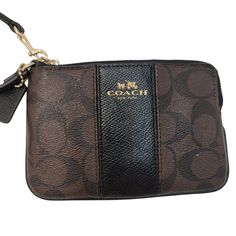 Coach Signature Brown And Black Two Tone Wristlet Wallet Clutch. Signature Coated Canvas And Smooth Leather Two Credit Card Slots Zip Closure Wrist Strap Attached 7 3/4" (L) X 4 3/4" (H) X 1/2" (W) Brand - Coach Color - Brown, Black Features - Wristlet, Zips Around, Zipper, Card Card Slots, Leather, Signature Logo Gender - Female Material - Leather Condition - New Without Tags Ships Same Or Next Day! Offers Welcomed! Big Bundle Discounts! Branding Coach, Coach New York, Credit Card Wallet, Coach Wristlet, Wristlet Wallet, Card Card, Women Accessories Bags, Signature Logo, Clutch Wallet