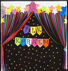 a black backdrop with colorful streamers, stars and the words i like karnen on it