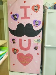 a pink door decorated with pictures and magnets that say i love you, mustache