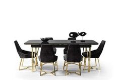 a dining table with black chairs around it