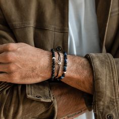 Help Dad feel a sense of positivity and patience with our Blue Sodalite & Matte Onyx Bead Bracelet this Father's Day. This bracelet features Blue Sodalite crystal beads along with Matte Onyx stones which offer two powerful energies that combine to create a powerful, and spiritual force. Handcrafted, and made with natural elements, this bracelet is punctuated with a black diamond at the center which provides additional luck and boosts positive energy as it protects against negativity. Healing Pow Strong Energy, Sentimental Jewellery, Sodalite Crystal, Brown Tiger Eye, Blue Sodalite, Green Malachite, Power Crystals, Onyx Bead, Pink Ring