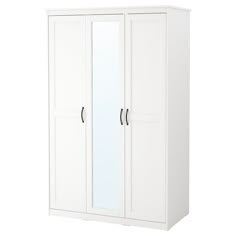 a white wardrobe with mirrored doors and drawers