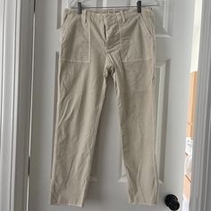 Nili Lotan Straight Leg Pants Cream Mid-Rise Distressed Accents Patch Pockets Zip & Button Closure Estimated Item Measurements Waist: 30.75" Hip: 38.75" Rise: 9.75" Inseam: 26.5" Leg Opening: 13" Fabric: 93% Cotton, 6% Polyester, 1% Spandex Pants Cream, Nili Lotan, Pants Color, Straight Leg Pants, Cream White, Leg Pants, Patch Pocket, Pant Jumpsuit, Mid Rise