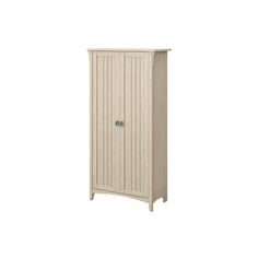 a tall white cabinet with two doors