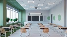 an empty classroom with desks and chairs in front of a chalkboard on the wall