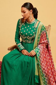 Green georgette anarkali featuring floral hand embroidery and a peek-a-boo neck. Paired with a bandhani printed dupatta., Fit: Relaxed Anarkali With Dupatta, Floral Hand Embroidery, Georgette Anarkali, Embroidered Anarkali, Embroidered Motifs, Printed Dupatta, Women Kurta, Floral Motifs, Aza Fashion