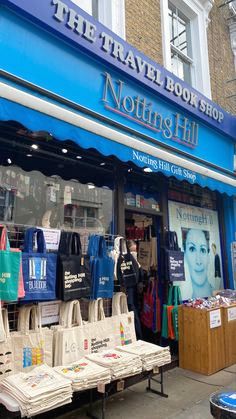 the travel book shop has many bags on display