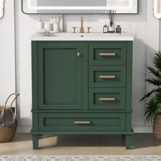 a bathroom vanity with green cabinet and mirror