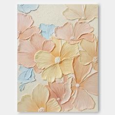 an abstract painting with flowers painted on it's side, in pastel colors