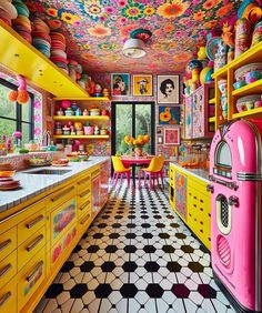 the kitchen is decorated in bright colors