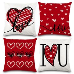 four pillows with hearts and i love you written in black on red, white or red