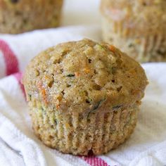 a muffin sitting on top of a white napkin