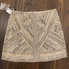 Tan Sequin Mini Skirt With Tags Still On Silk Skort, Pink Club, Red Pleated Skirt, Satin Pencil Skirt, Mini Skirt Party, Printed Silk Skirt, Ruffled Mini Skirt, Feather Skirt, Color Block Skirt