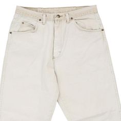 Vintage Wrangler white jeans, fit a 31" waist and 27" inseam. WAIST: 31 inches / 79cmsINSEAM: 27 inches / 69cmsRISE: 12 inches / 30cmsGENDER: mens CONDITION: good - discoloured marks on wasitband, small mark on front.STYLE: jeansERA: 1990sCOLOUR: whiteFABRIC: cotton Classic White Jeans With Standard Cut Leg, White Cotton Jeans With Standard Cut Leg, White Cotton Jeans Standard Cut, White Jeans With Five Pockets, White Cotton Jeans With Standard Cut, White Cotton Standard Cut Jeans, Vintage White Straight Leg Pants, Vintage Wrangler, Wrangler Jeans