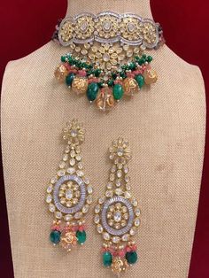 Premium quality Designer piece. American diamond lining . Uncut foil kundan, crystal beads, tumble beads . Glass quartz band work. widest part of the choker is about 2 inch. Beaded part sits in the neck in V shape. Comes with matching kundan earring . Oversize about 5.5 inch long . Light weight , push back . Heavy Kundan Choker For Festivals, Hand-set Kundan Choker Necklace For Festivals, Hand Set Kundan Choker For Festivals, Hand Set Kundan Choker Necklace For Festivals, Festive Kundan Choker With Mirror Work, Festive Beaded Kundan Choker Necklace, Kundan Beaded Choker For Parties, Party Kundan Choker With Mirror Work, Festive Kundan Beaded Choker