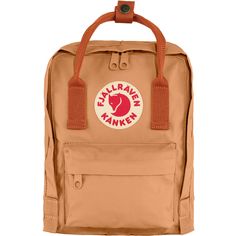 Kånken was created in 1978 to help prevent back problems among Swedish school children and, since then, has become one of Fjällräven's most appreciated products. The Mini-version is suitable for small children as well as for full grown adults who are looking for a small backpack. It is perfect for carrying a change of clothes for preschool or food on an outing, and as a smart everyday bag for books, water bottles, fruit and more. The shoulder straps are long and adjustable and fit both small and big backs. They can be fastened with a clasp so that they are not in the way when at their tightest. The material is hard-wearing, lightweight Vinylon F fabric that is able to withstand dirt and wetness. The main compartment has a large zipped opening, which makes it easy to pack and unpack. Two fl Fjallraven Kanken Mini, Kanken Classic, Popular Backpacks, Kanken Mini, Fjällräven Kånken, Mini Mochila, Backpack Reviews, Classic Backpack, Small Backpack