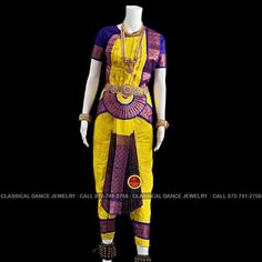 Design by Classical Dance Jewelry® ❥ Traditional Bharatanatyam costume wore during regular dance programs or arrangetram performance. ❥ Material : Art Silk ❥ Type : Traditional pant costume ❥ Easy to wear ❥ layer front fan ❥❥❥❥ 32 inch PANT LENGTH Dress Measurements ( all the measurements approximately 1 -2 margin buffer) Age: 9 - 12 yrs ❥ PANT MEASUREMENTS: ☛ Pant Length: 31-32 inch ☛ Pant Waist: 29-30 inch ☛ Pant Hip: 30-31 ❥ BLOUSE MEASUREMENTS: ☛ Blouse length: 11-12 inch ☛ Blouse Shoulder : Traditional Dance Sets With Zari Work, Ceremonial Churidar With Pallu For Navratri, Yellow Churidar For Puja And Festivals, Fitted Traditional Wear For Dance, Fitted Traditional Wear With Pallu For Dance, Ceremonial Churidar With Traditional Drape For Festivals, Traditional Wear For Dance Festivals, Fitted Traditional Wear For Navratri Dance, Fitted Traditional Dance Wear With Drape