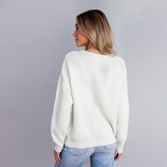 Keep it effortlessly cool with the White Drop Shoulder Long Sleeve Sweater. The relaxed fit and drop shoulders make this piece your go-to for laid-back style that’s both comfy and chic. Product code: CAA06A3H009CC