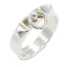 Used Hermes Ring "Collier De Chien" Ring, Silver 925, Women's, H115607b 00056 (Sku: Gzl13s20) === General === Brand : Hermes Line : Collier De Chien === Design === Type : Band Ring Gender : Women Material : Silver 925 === Size === Other Size : 56 Width : 5mm / 0.2'' Weight : 4.9g / 0.17oz. === Included Items === Accessories : Case Accessories Notice : Before Purchasing, Please Refer To The Images Of The Accessories Included With The Item. === Condition === Condition : Opened (Never Used) Ranking Designer Sterling Silver Rings With Polished Finish, Designer White Gold Ring In Sterling Silver, Designer Sterling Silver Hallmarked Rings, Designer Sterling Silver Rings, Hallmarked, Designer Sterling Silver Rings For Formal Occasions, Hermes Ring, Hermes Jewelry, Ring Pictures, Ring Silver