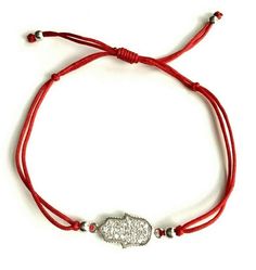 925 sterling silver hamsa red bracelet .adjustable . for protection ,good luck and prosperty. --comes with free gift pouche. pulsera rojo de plata esterlina 925 mano de fatima . ajustable. para proteccion ,buena suerte y prosperidad. --gratis bolsa de regalo. Nickel-free Red Sterling Silver Bracelet, Traditional Jewelry Gift With Adjustable Length, Traditional Jewelry With Adjustable Length As Gift, Traditional Jewelry As A Gift With Adjustable Length, Red Bracelet With Adjustable Chain For Gift, Red Bracelet With Adjustable Chain As Gift, Red Spiritual Jewelry With Adjustable Cord, Sterling Silver Bracelets With Adjustable Cord Gift, Adjustable Red Nickel-free Bracelets