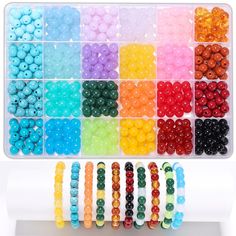 an assortment of beads in a plastic container