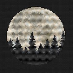 a cross stitch pattern with trees and the moon in the background