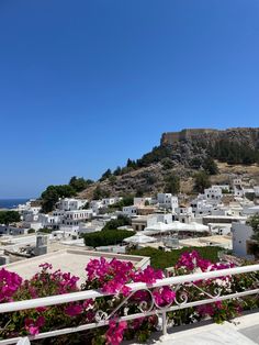 View of Lindos village on the Greek island Rhodes with the view of its cliff top acropolis. Beautiful white town. White washed houses. Gap Year Travel, Rhodes Island, Sun Aesthetic, Beautiful Cities, Gap Year, Acropolis, Greek Island