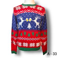 "Get ready for the holiday season with this festive sweater from Jolly Sweaters! The multicolor Fair Isle pattern and cute reindeer drinking design make it the perfect addition to any party or casual outfit. The tight-knit acrylic material with cap sleeves and a relaxed fit ensure comfort and style, and the collarless pullover design adds a touch of vintage charm. This unisex sweater in size M is ideal for anyone looking to stay warm and cozy during the fall and winter seasons. Whether you're dressing up for an ugly Christmas sweater party or just looking for a comfortable and festive addition to your wardrobe, this sweater is sure to be a hit. Not all garments run true to tag size so PLEASE PAY ATTENTION TO MEASUREMENTS WE HAVE PROVIDED FOR AN ACCURATE FIT. Pit x pit: 20\" Length: 27\" Sl Christmas Party Crew Neck Sweater, Multicolor Long Sleeve Christmas Sweater, Festive Christmas Fair Isle Sweater, Festive Fair Isle Christmas Sweater, Red Holiday Party Sweater, Christmas Holiday Fair Isle Tops, Fair Isle Pattern Tops For Christmas Holiday, Blue Christmas Holiday Sweater, Red Christmas Party Sweater