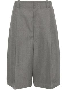 medium grey virgin wool pleat detailing pressed crease belt loops two diagonal pockets to the sides rear patch pocket knee-length concealed front button, hook and zip fastening Gray Workwear Shorts, Gray Knee-length Bottoms For Workwear, Gray Knee-length Workwear Bottoms, Classic Short Wool Bottoms, Classic Knee-length Wool Bottoms, Wool Shorts, City Shorts, Versace Outfit, Tailored Shorts