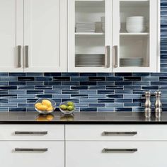 the kitchen counter is clean and ready to be used for cooking or serving dishes on it