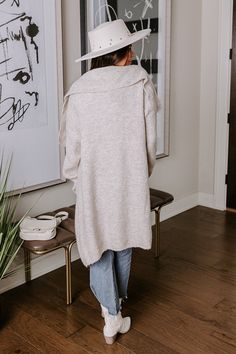 Layer up for fall fun in our cozy 'Fall Retreat' cardigan! Features soft stone colored tight knit material, an oversized collar, long loose sleeves with ribbed cuffs, low pockets with ribbed accent, and an open draped silhouette that ends in a straight knee-length hemline. Measurements S-M : Bust 46", Hip 44", Length 33.5", Sleeve Length 23", Waist 44". M-L : Bust 48", Hip 46", Length 34.5", Sleeve Length 23.5", Waist 46". Relaxed Fit Open Knit Cardigan For Fall, Relaxed Fit Long Sleeve Knit Cardigan, Oversized Long Sleeve Versatile Cardigan, Beige Cozy Open Knit Cardigan, Long-sleeve Textured Cotton Cardigan, Knitting Materials, Cozy Fall, Fall Fun, Stone Color