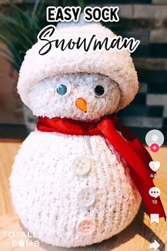 a snowman made out of yarn with the words easy sock snowman on it